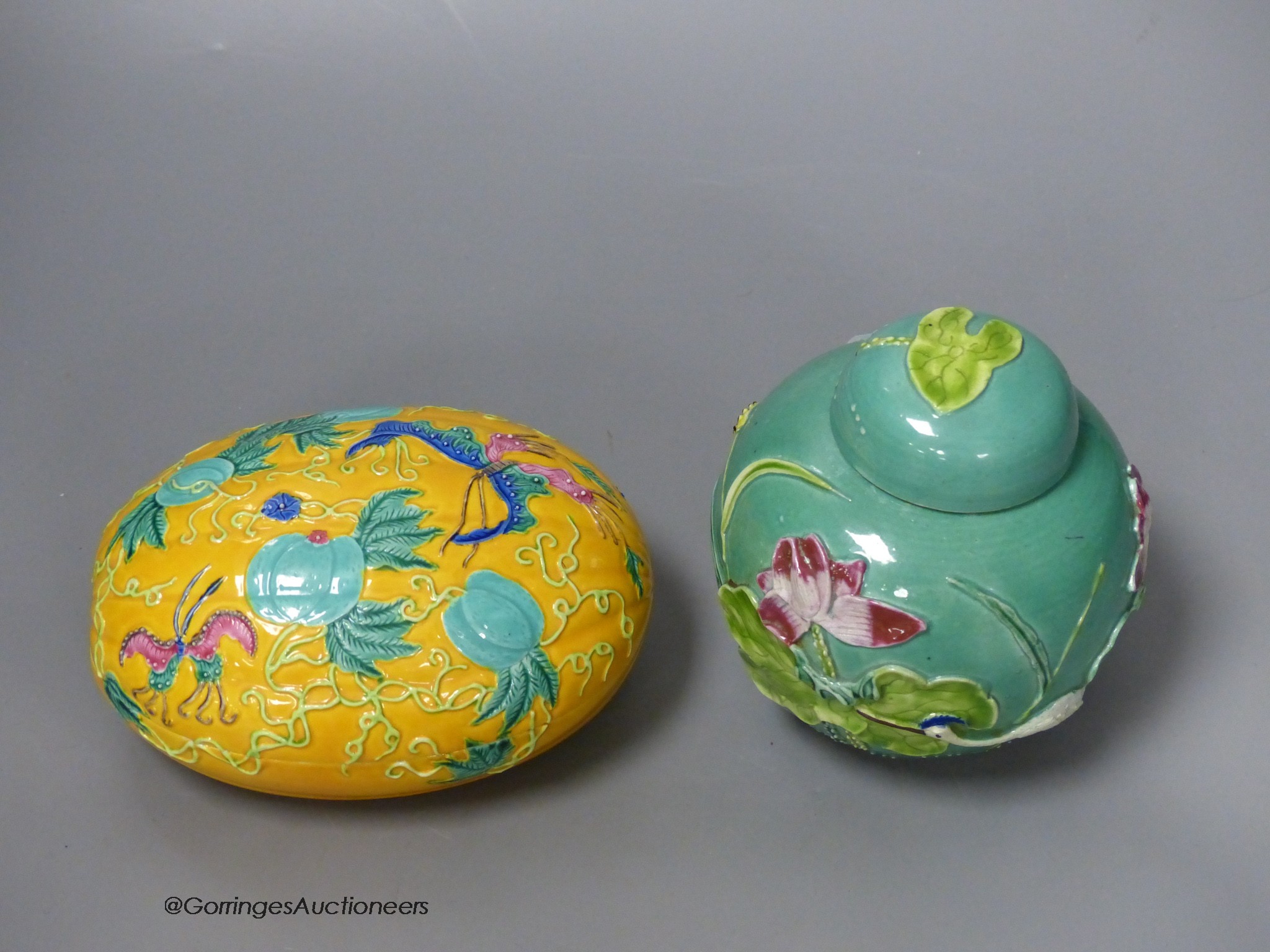 A Chinese polychrome glazed jar and cover and a similar box and cover, tallest 11cm